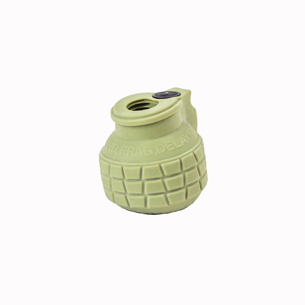 A green grenade-shaped vibrator with a textured surface and a button on the top.
